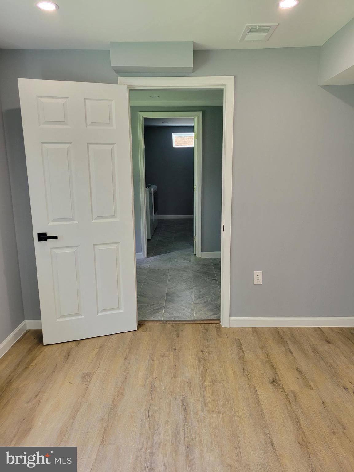 8825 Lanier Drive Silver Spring, MD 20910 - Photo 44 of 56 basement suite view to rear foyer, laundry