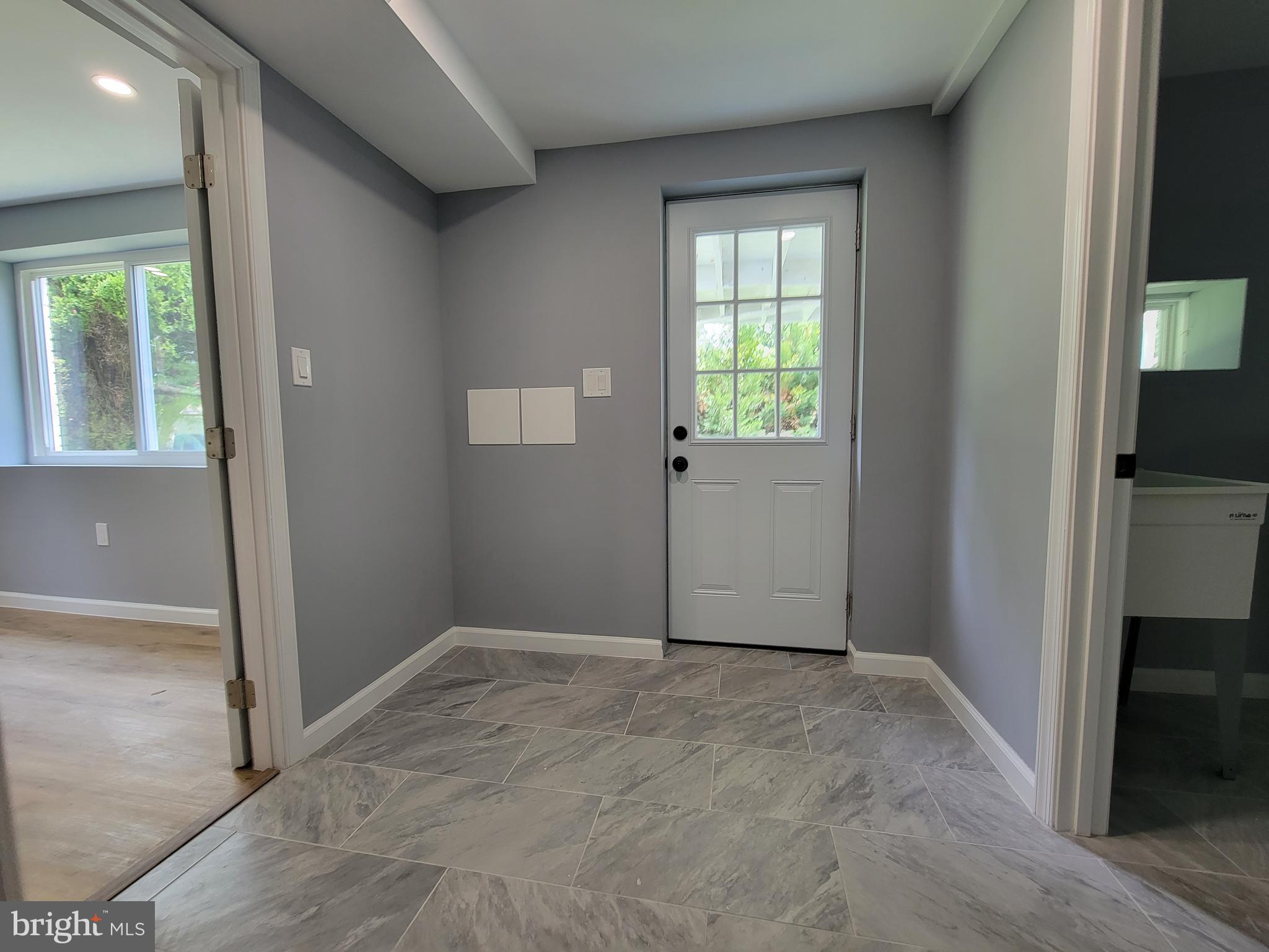 8825 Lanier Drive Silver Spring, MD 20910 - Photo 48 of 56 rear foyer or mudroom