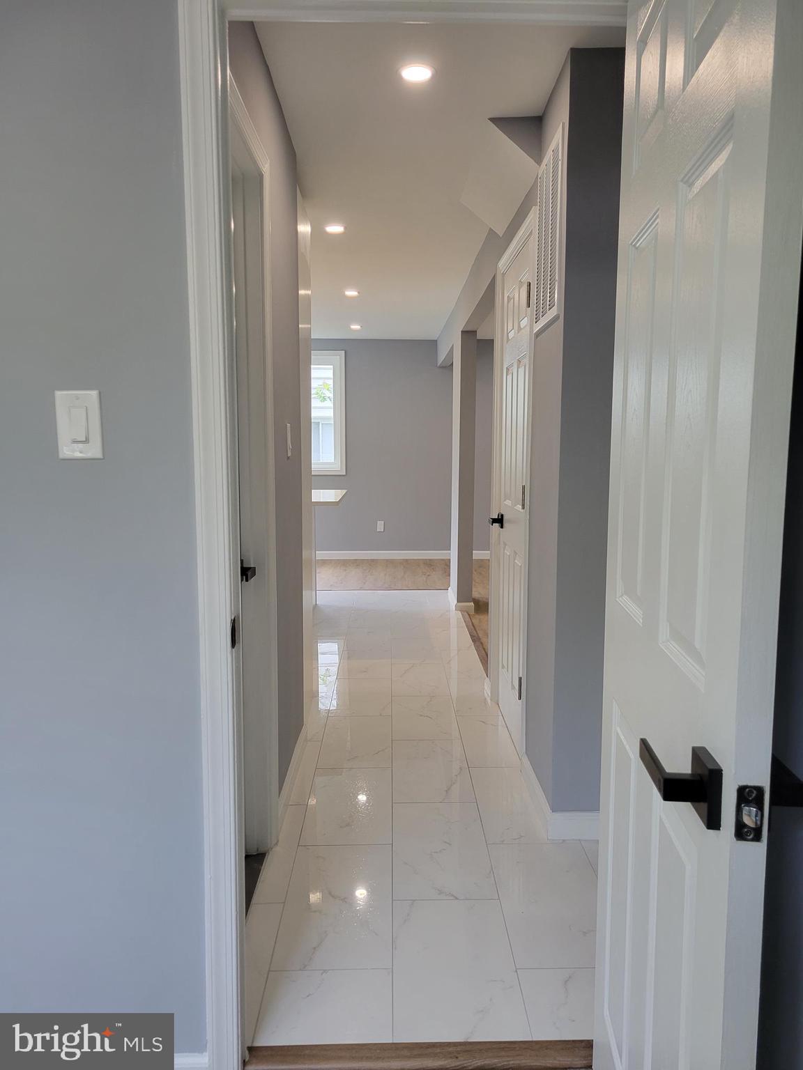 8825 Lanier Drive Silver Spring, MD 20910 - Photo 53 of 56 Main level hallway to kitchen