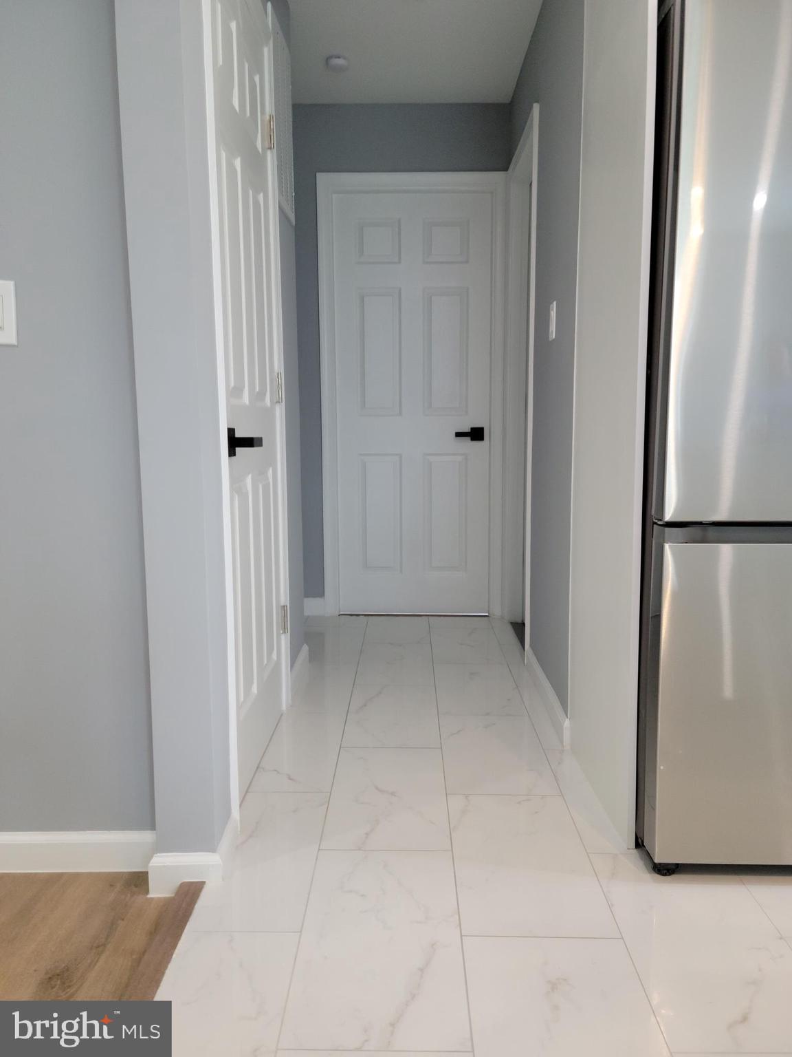 8825 Lanier Drive Silver Spring, MD 20910 - Photo 54 of 56 Main level bedroom hallway