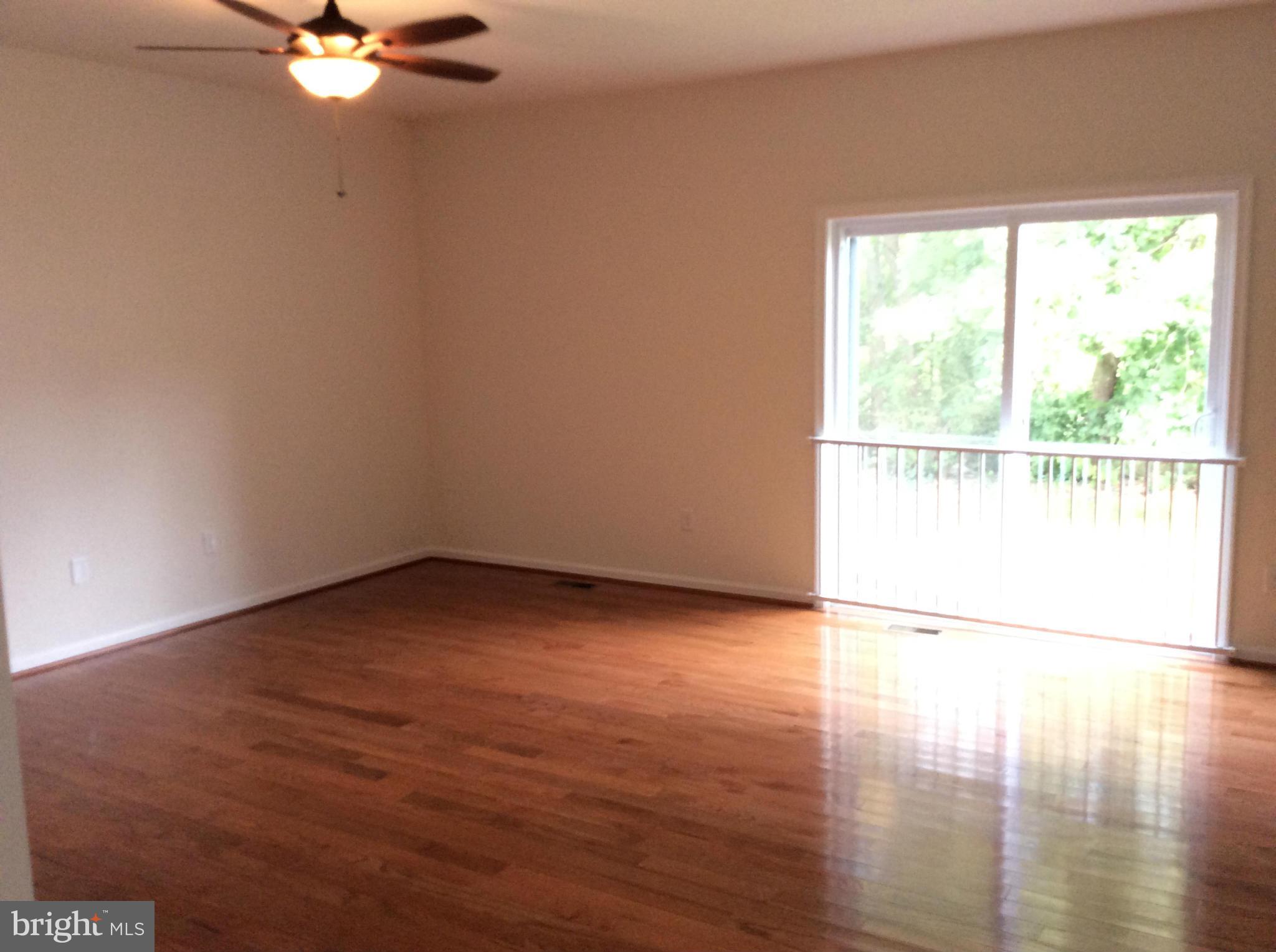 8365 WB&A Road Severn, MD 21144 - Photo 19 of 30 Family Room complete with slider to backyard.