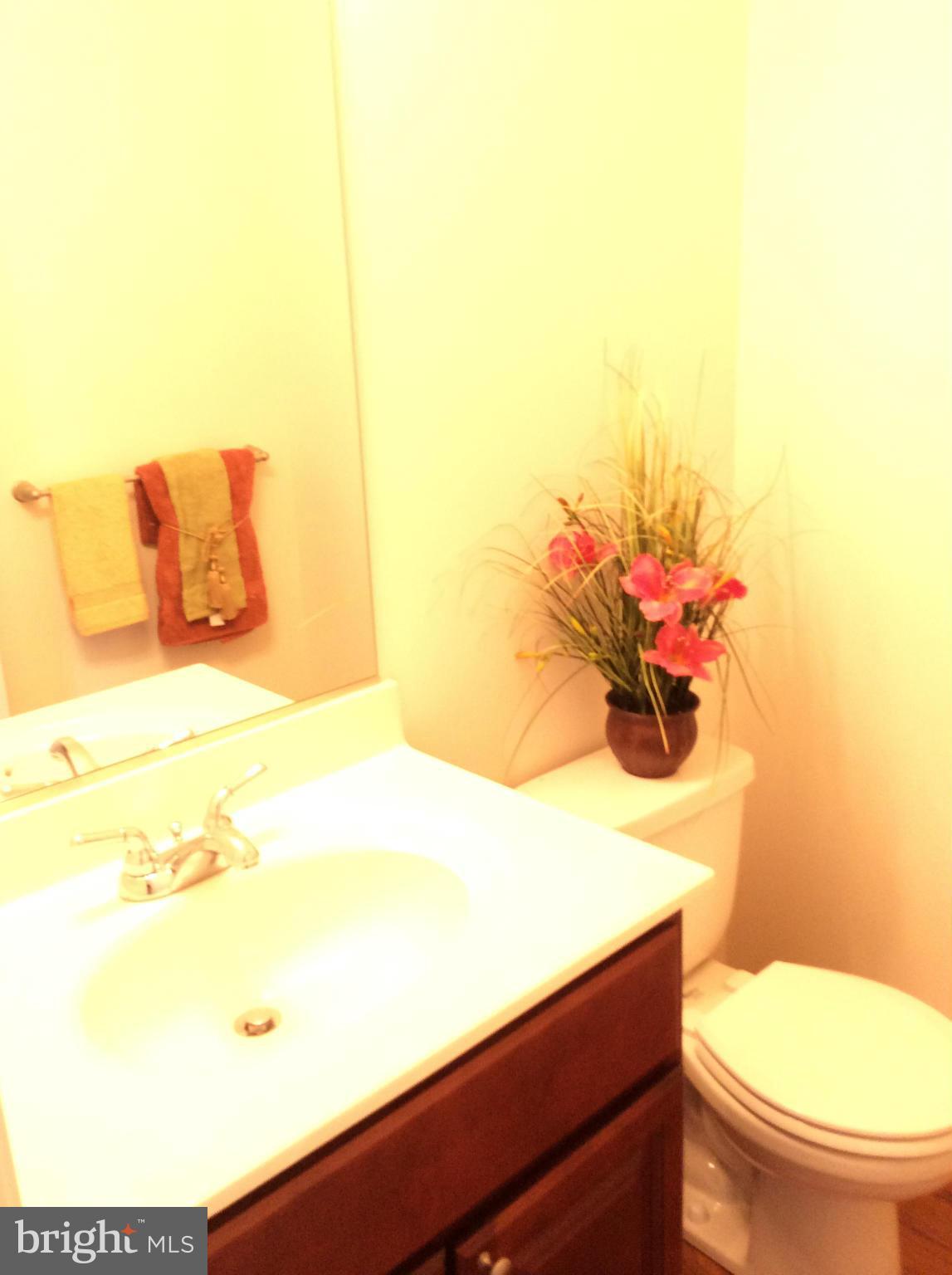 8365 WB&A Road Severn, MD 21144 - Photo 21 of 30 Half Bath off Family Room for convenience