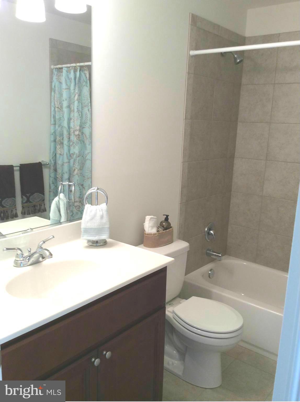 8365 WB&A Road Severn, MD 21144 - Photo 6 of 30 Ceramic Tiled Full Hall Bath