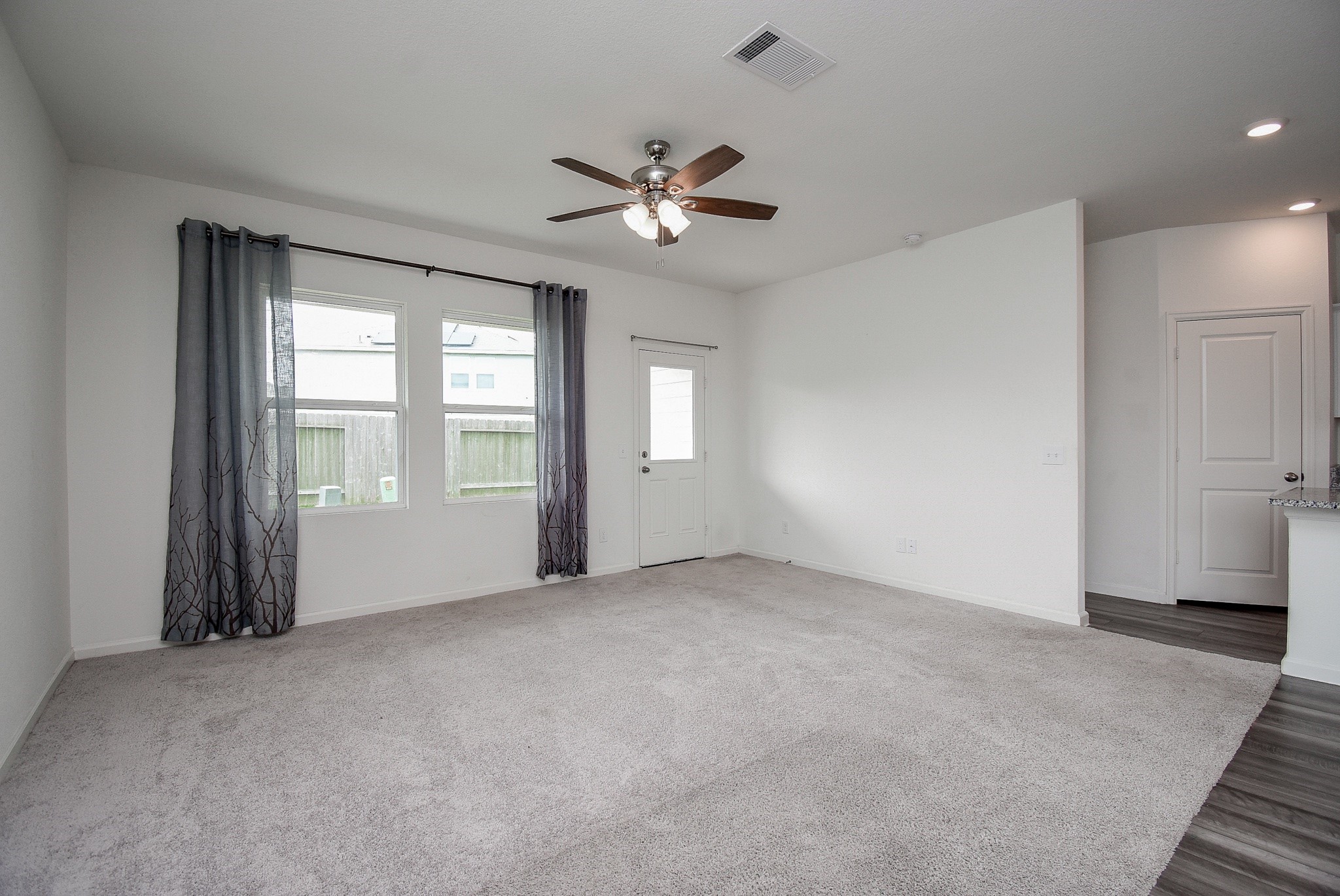 13542 Kinsman Road Houston, TX 77049 - Photo 15 of 43 a view of an empty room with a window