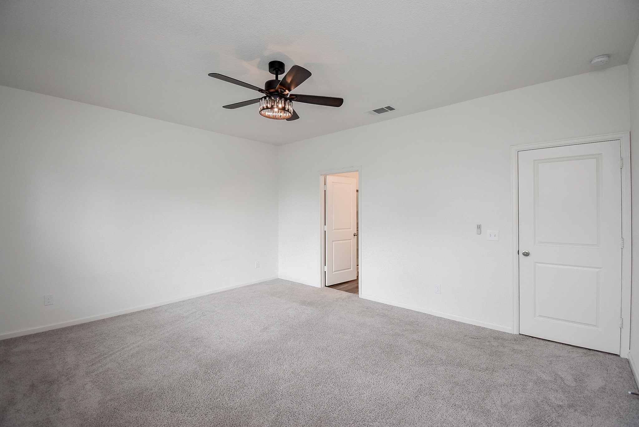 13542 Kinsman Road Houston, TX 77049 - Photo 18 of 43 a view of a big room with a ceiling fan