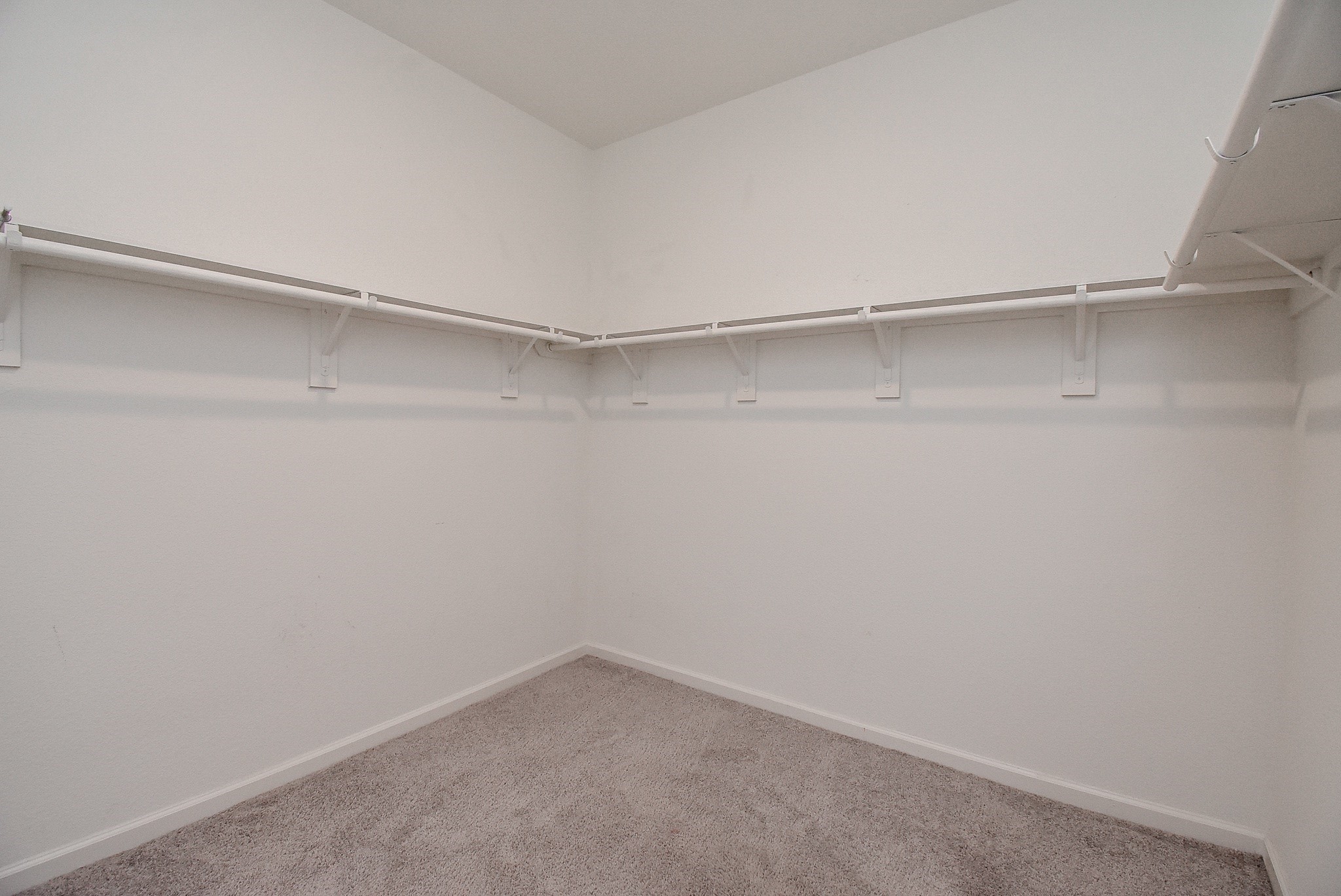 13542 Kinsman Road Houston, TX 77049 - Photo 22 of 43 a view of an empty walk in closet