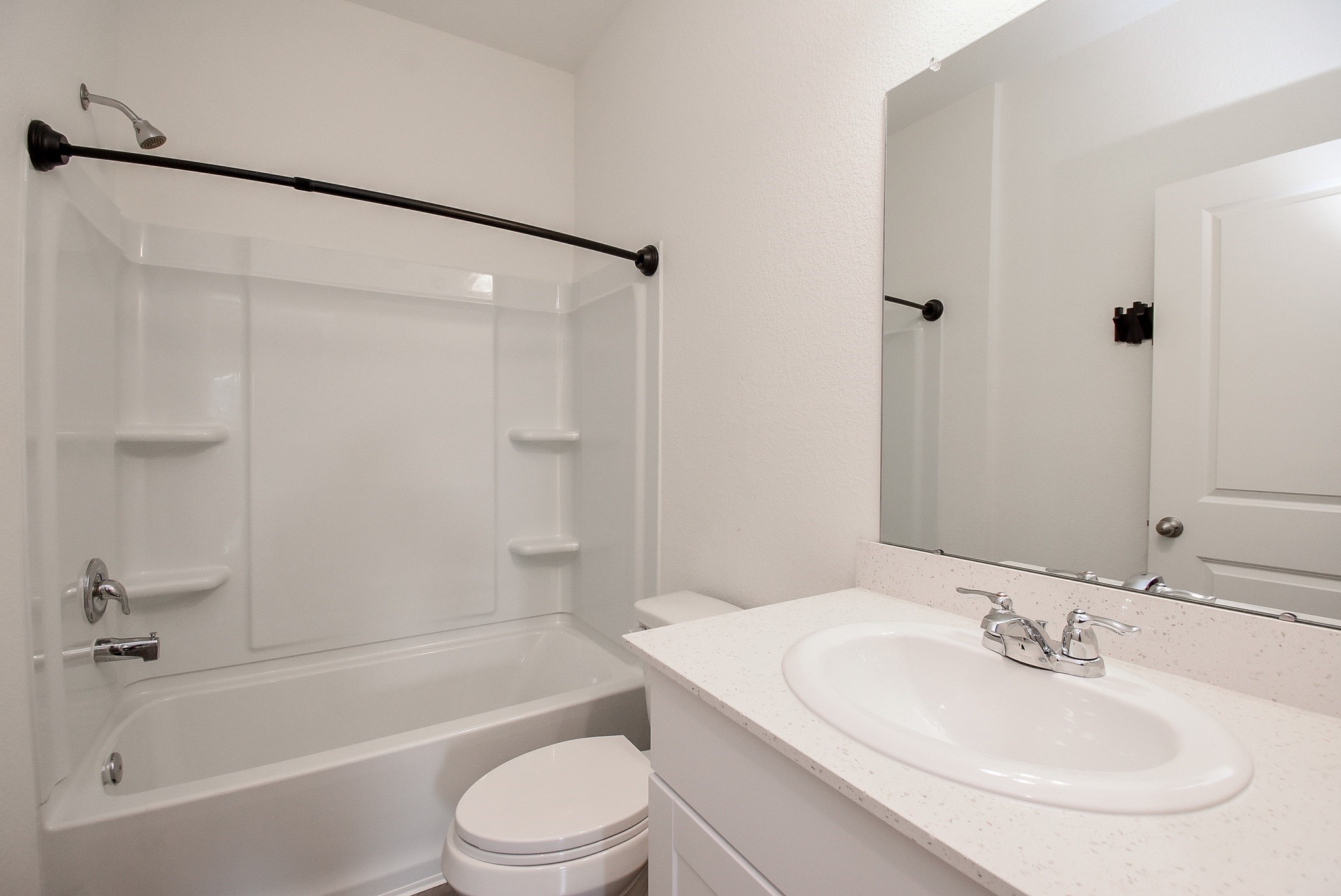 13542 Kinsman Road Houston, TX 77049 - Photo 25 of 43 a bathroom with a sink toilet and shower