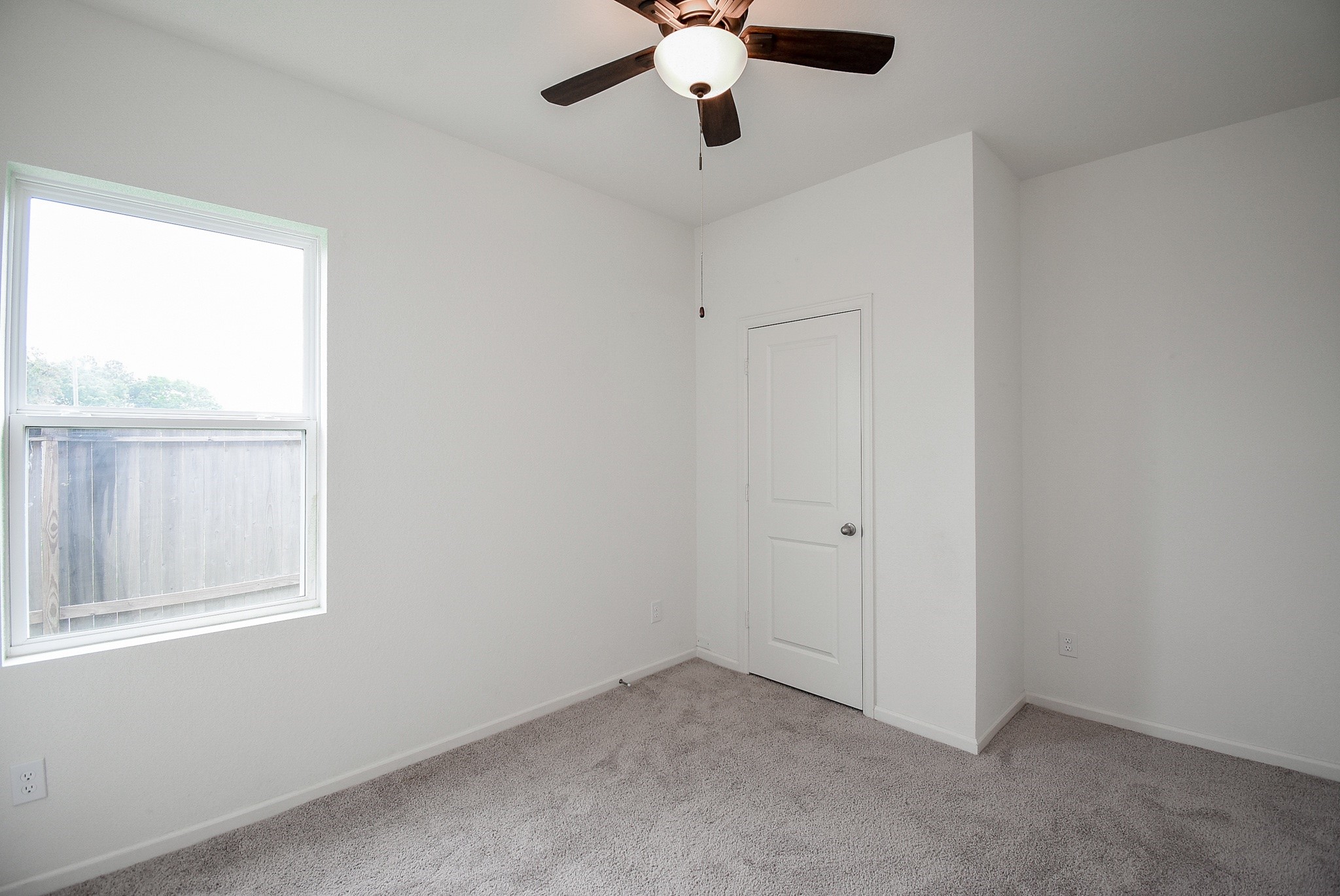 13542 Kinsman Road Houston, TX 77049 - Photo 31 of 43 an empty room with a window