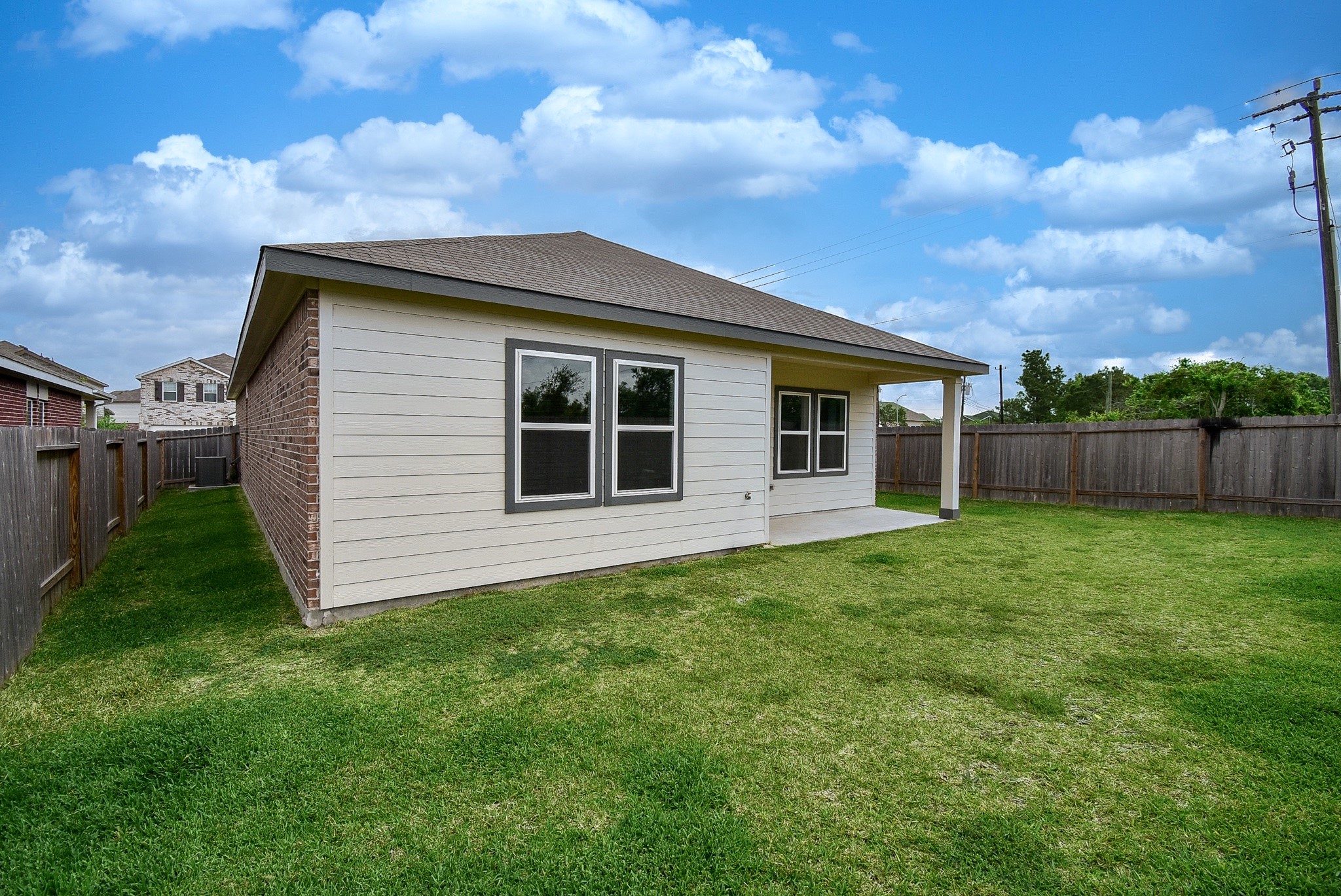 13542 Kinsman Road Houston, TX 77049 - Photo 37 of 43 a backyard of a house with lots of green space