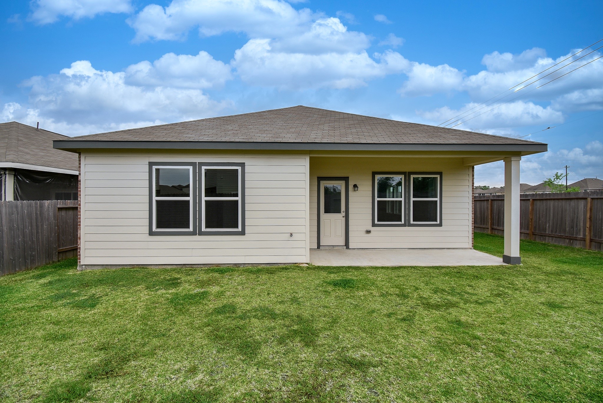 13542 Kinsman Road Houston, TX 77049 - Photo 38 of 43 a front view of a house with a garden