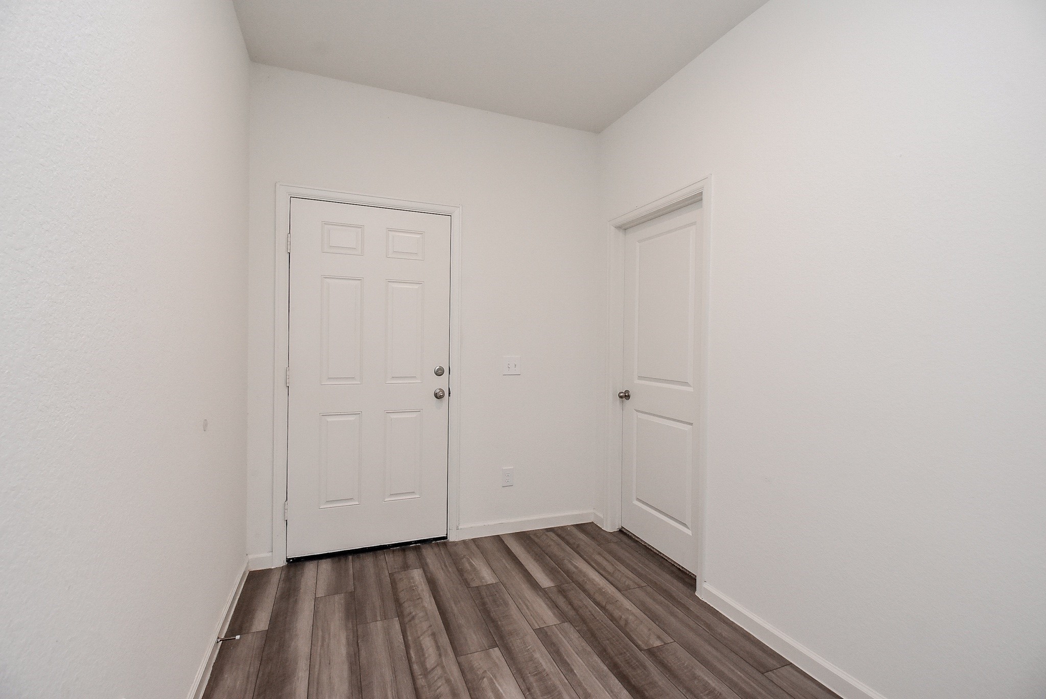 13542 Kinsman Road Houston, TX 77049 - Photo 4 of 43 a view of a room with wooden floor and closet