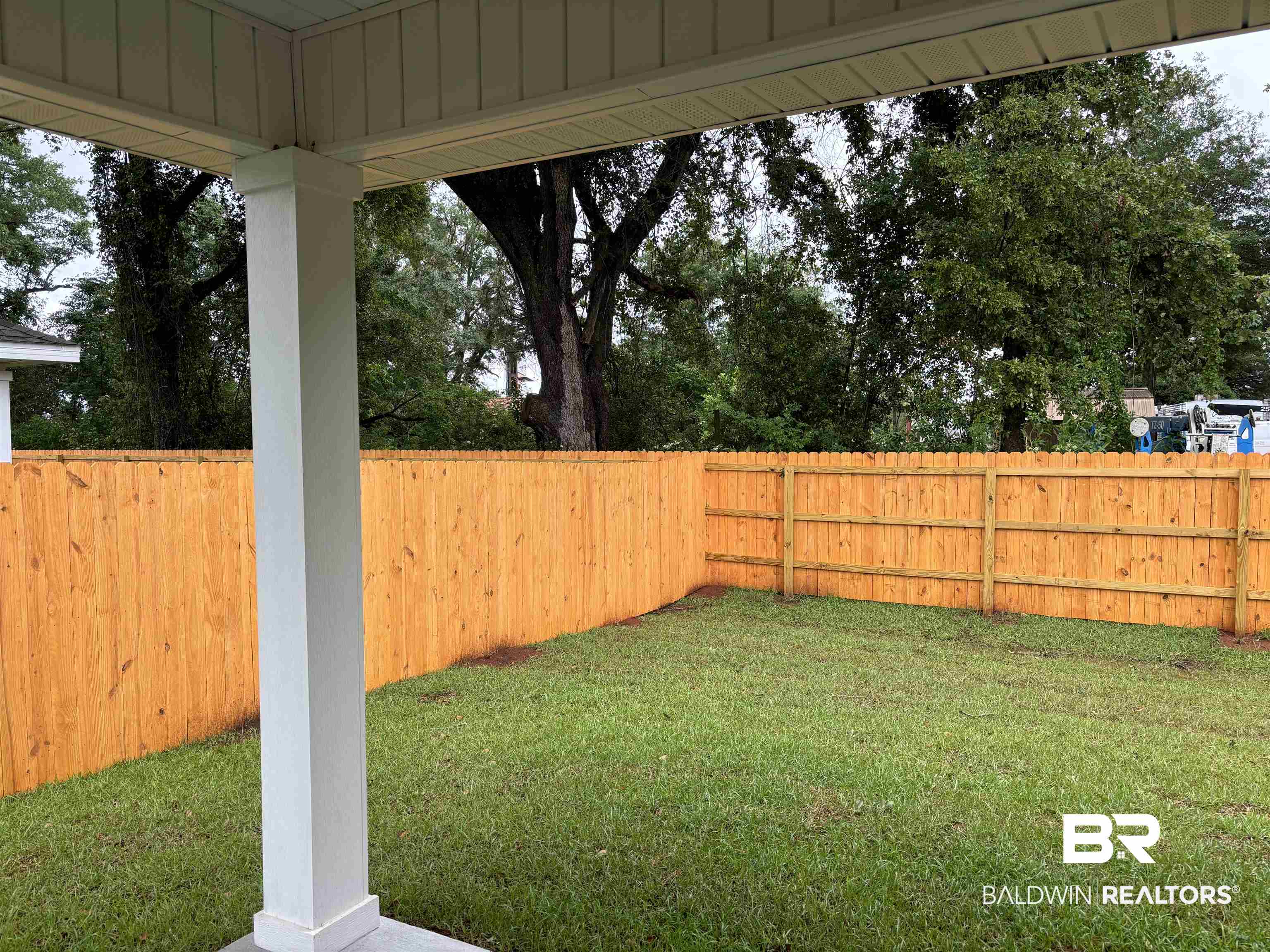 24802 Ponder Loop Loxley, AL 36551 - Photo 7 of 50 Backyard From Under Patio