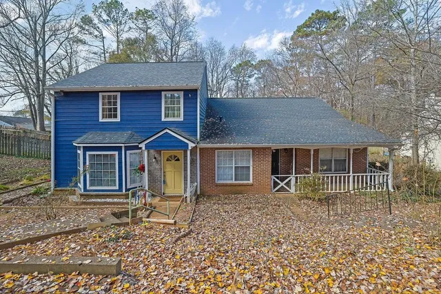 front view of a house with a yard