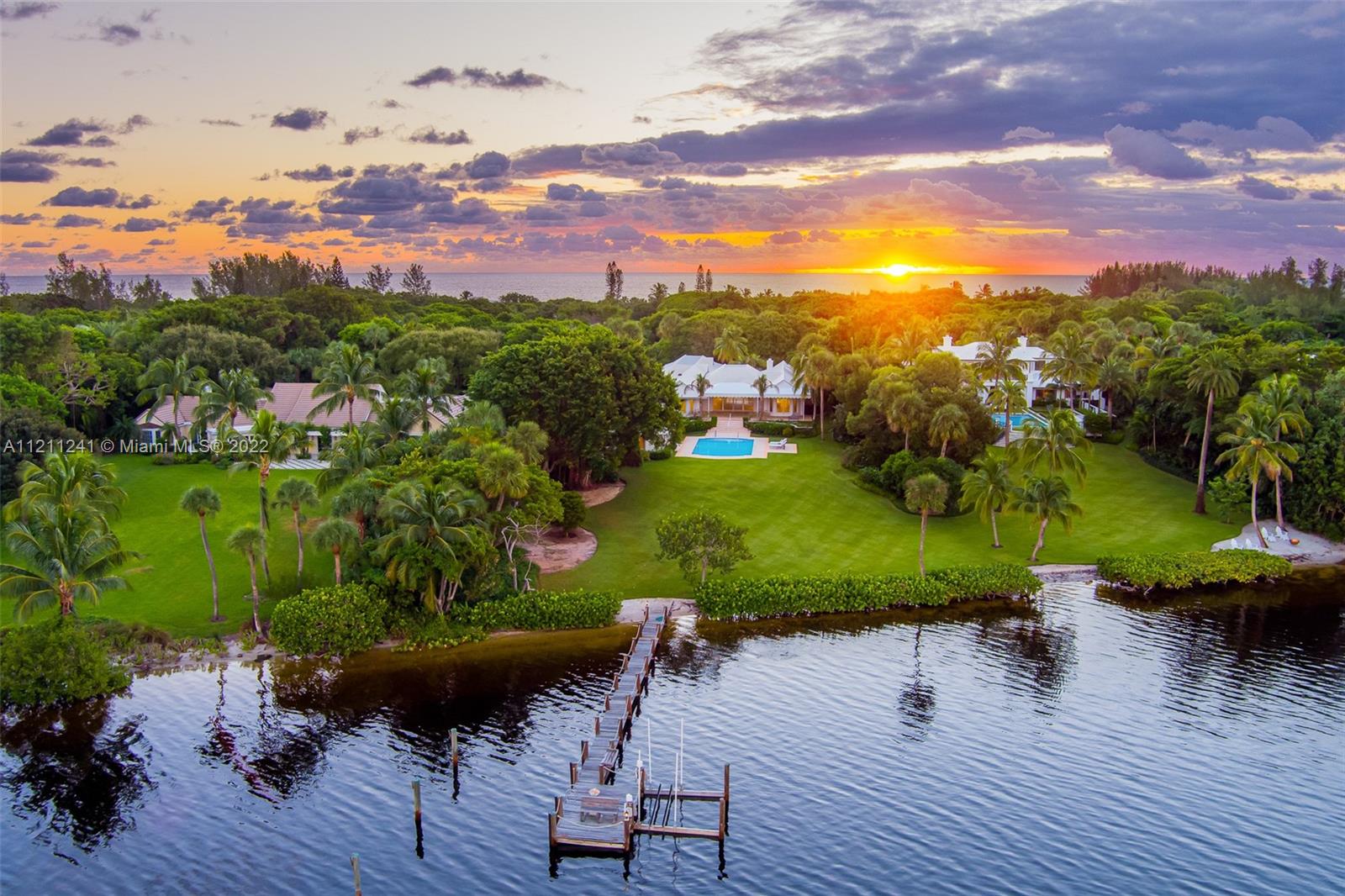 a view of a garden with sitting area