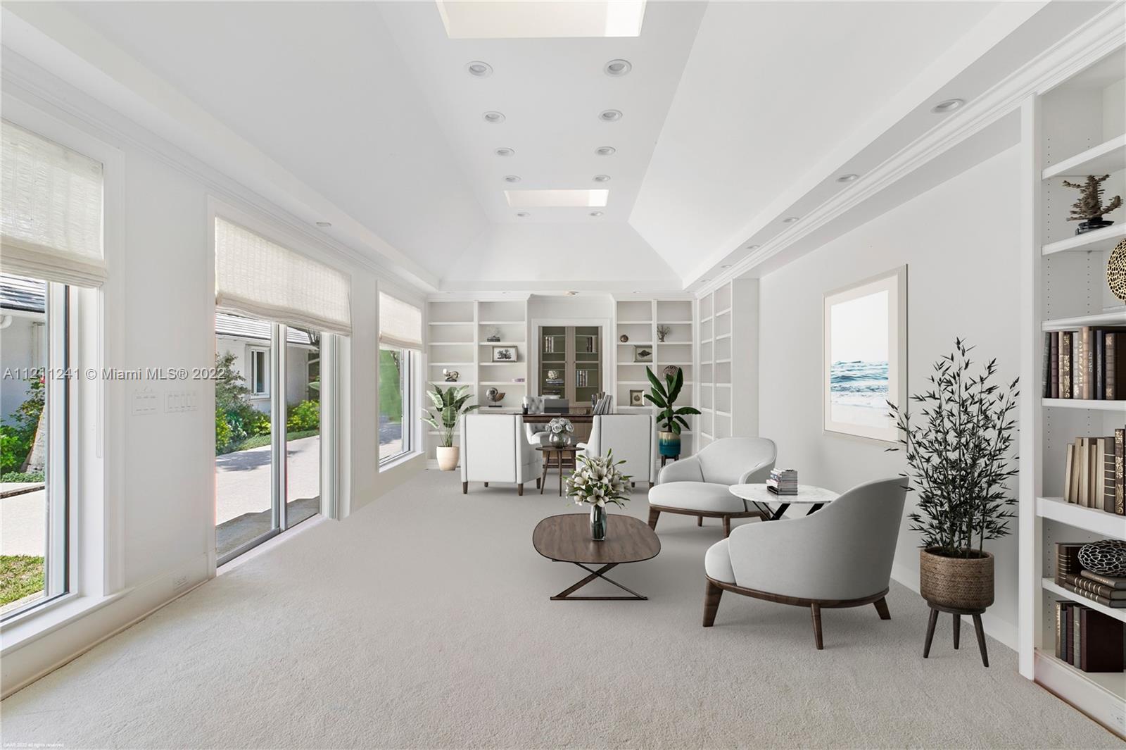 318 South Beach Road Hobe Sound, FL 33455 - Photo 39 of 69 a living room with furniture and a large window