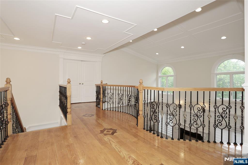 65 Ross Avenue Demarest, NJ 07627 - Photo 38 of 48 a view of a hallway with a livingroom