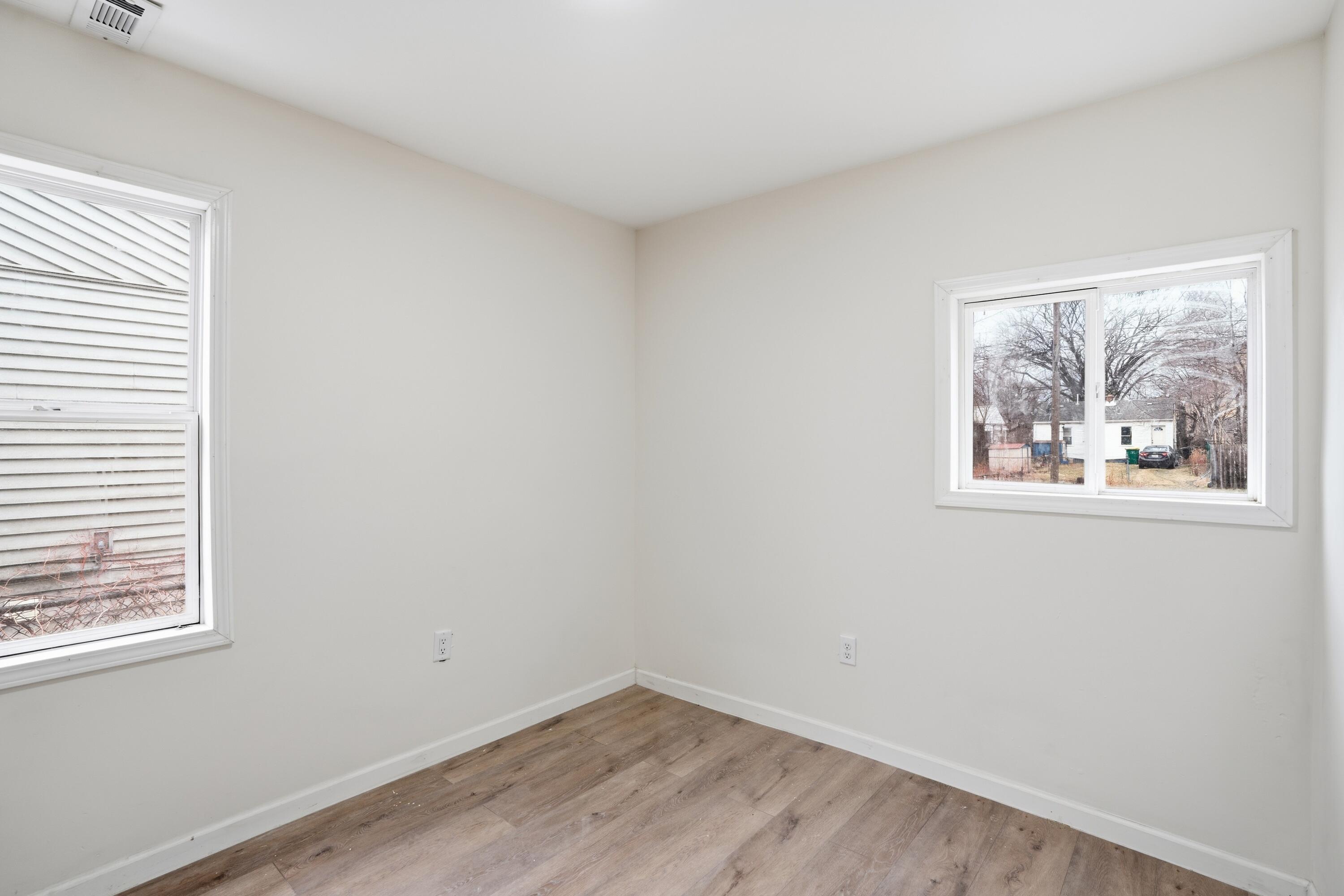 2314 Kentucky Street Gary, IN 46407 - Photo 14 of 16 an empty room with a window