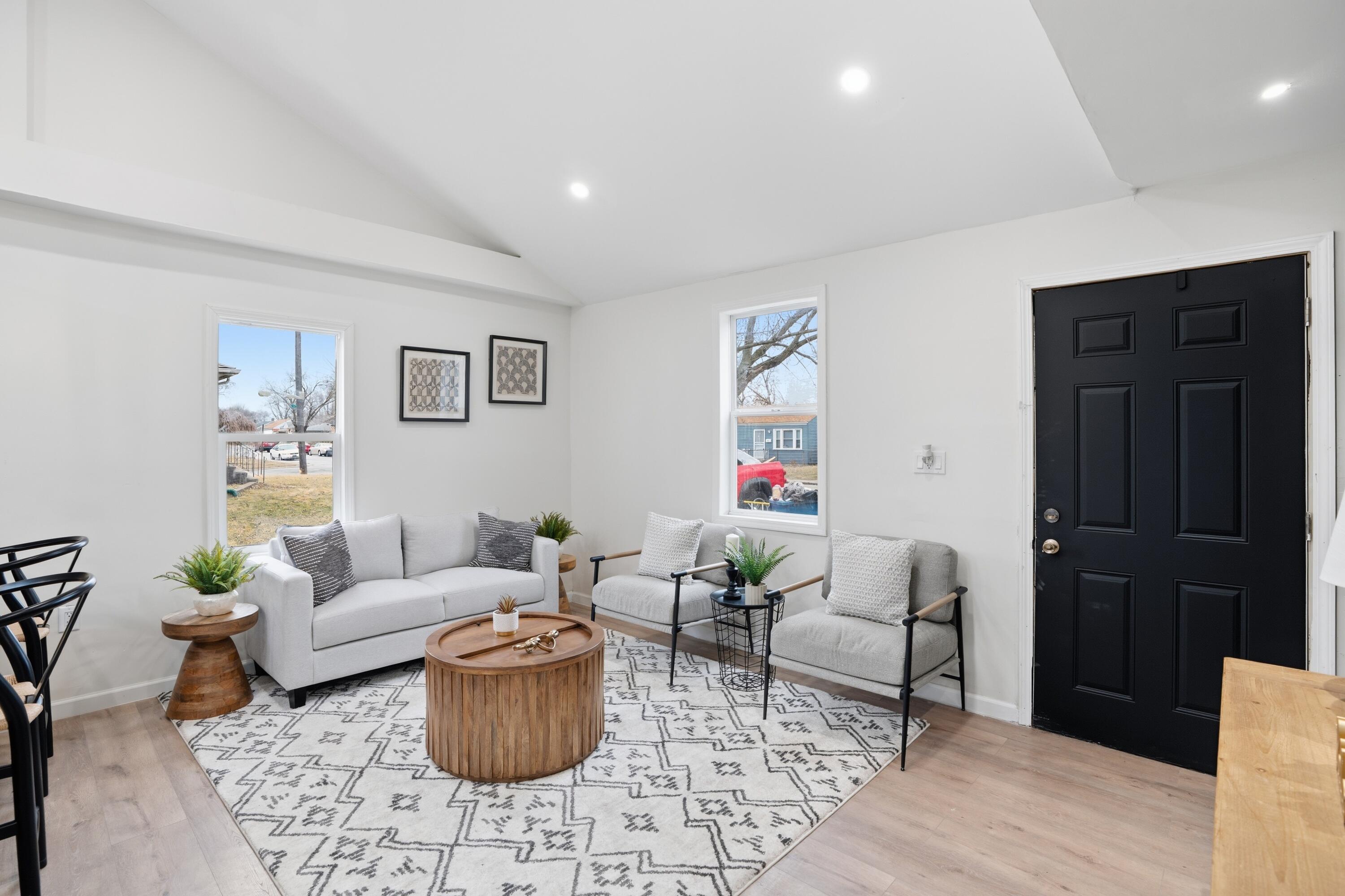 2314 Kentucky Street Gary, IN 46407 - Photo 2 of 16 a living room with furniture and wooden floor