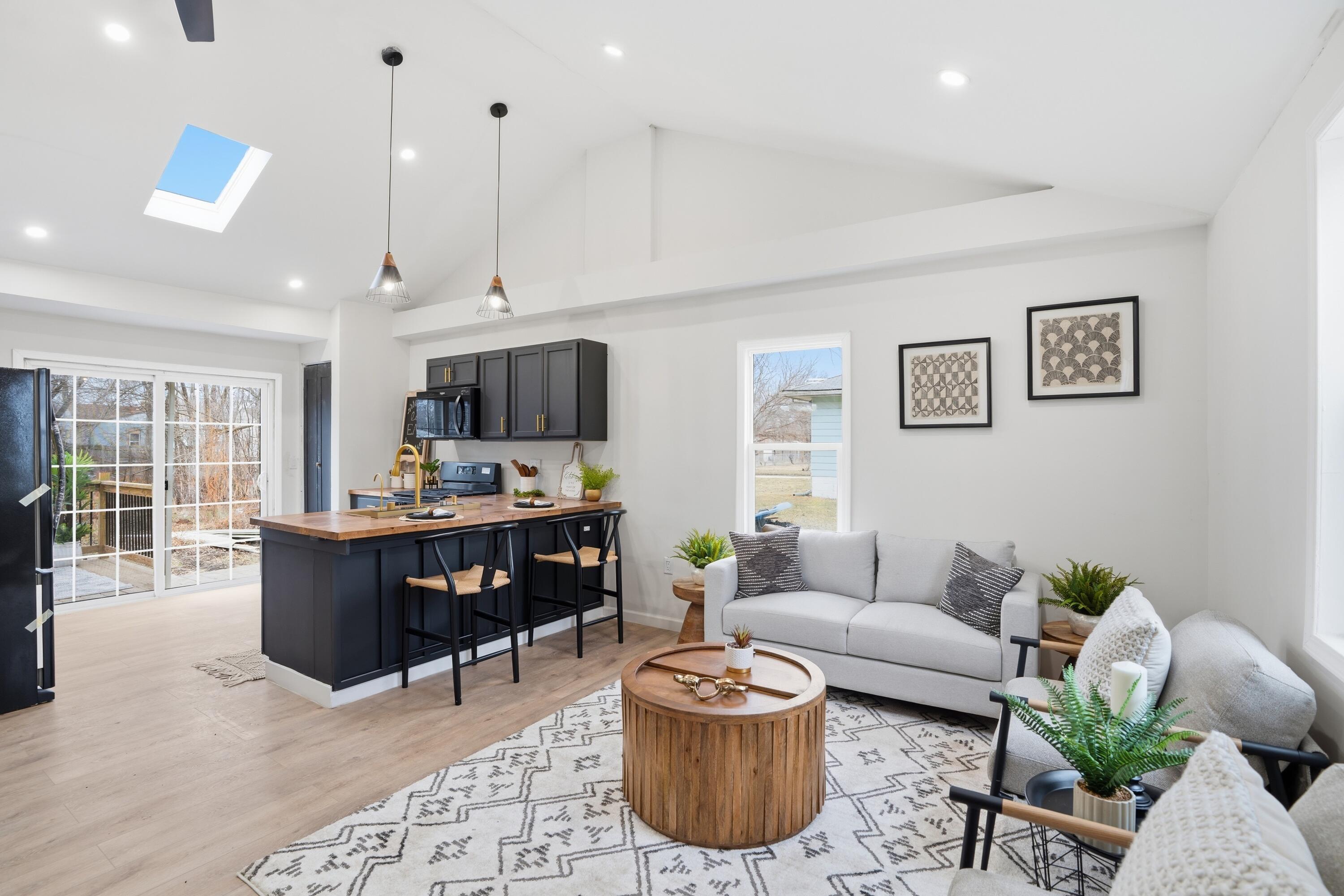 2314 Kentucky Street Gary, IN 46407 - Photo 3 of 16 a living room with furniture and a flat screen tv