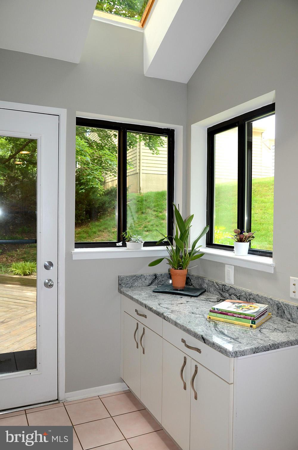 11030 Solaridge Drive Reston, VA 20191 - Photo 12 of 30 a kitchen with sink and window