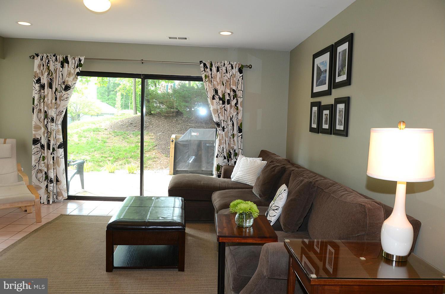 11030 Solaridge Drive Reston, VA 20191 - Photo 14 of 30 a living room with furniture and a large window