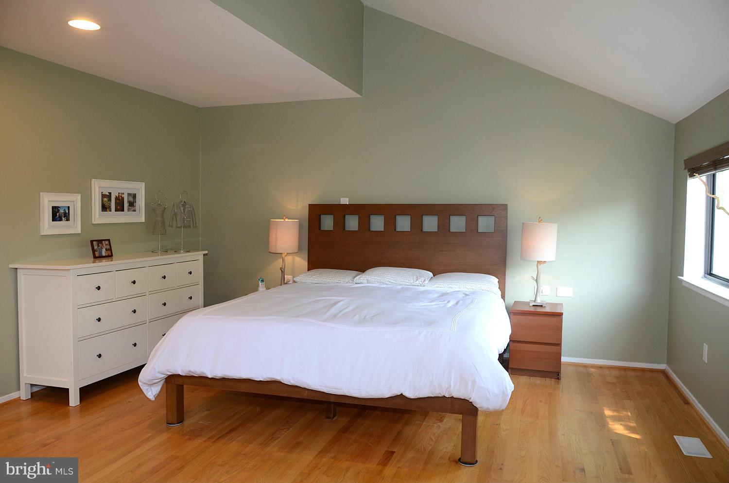 11030 Solaridge Drive Reston, VA 20191 - Photo 18 of 30 a bedroom with a bed and window