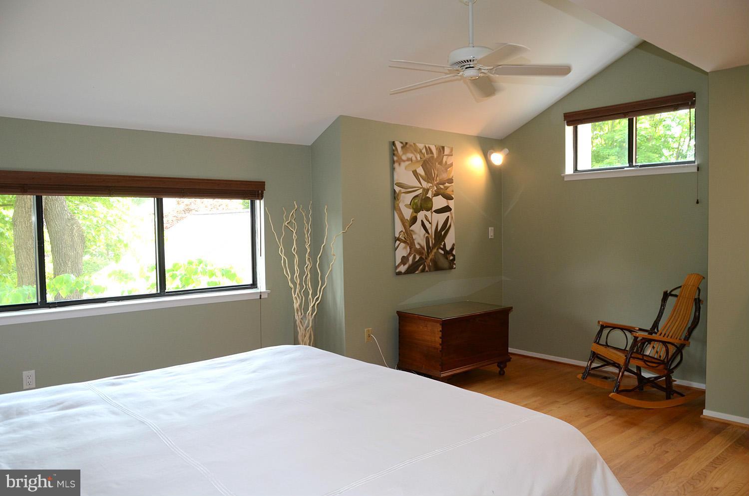 11030 Solaridge Drive Reston, VA 20191 - Photo 19 of 30 a bedroom with a bed and a window