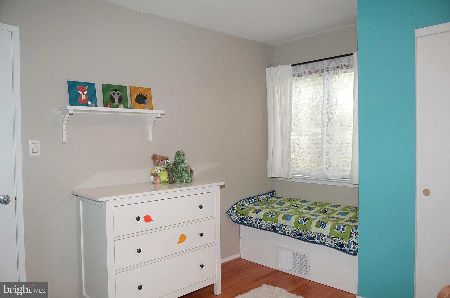 11030 Solaridge Drive Reston, VA 20191 - Photo 23 of 30 a room that has a dresser in it