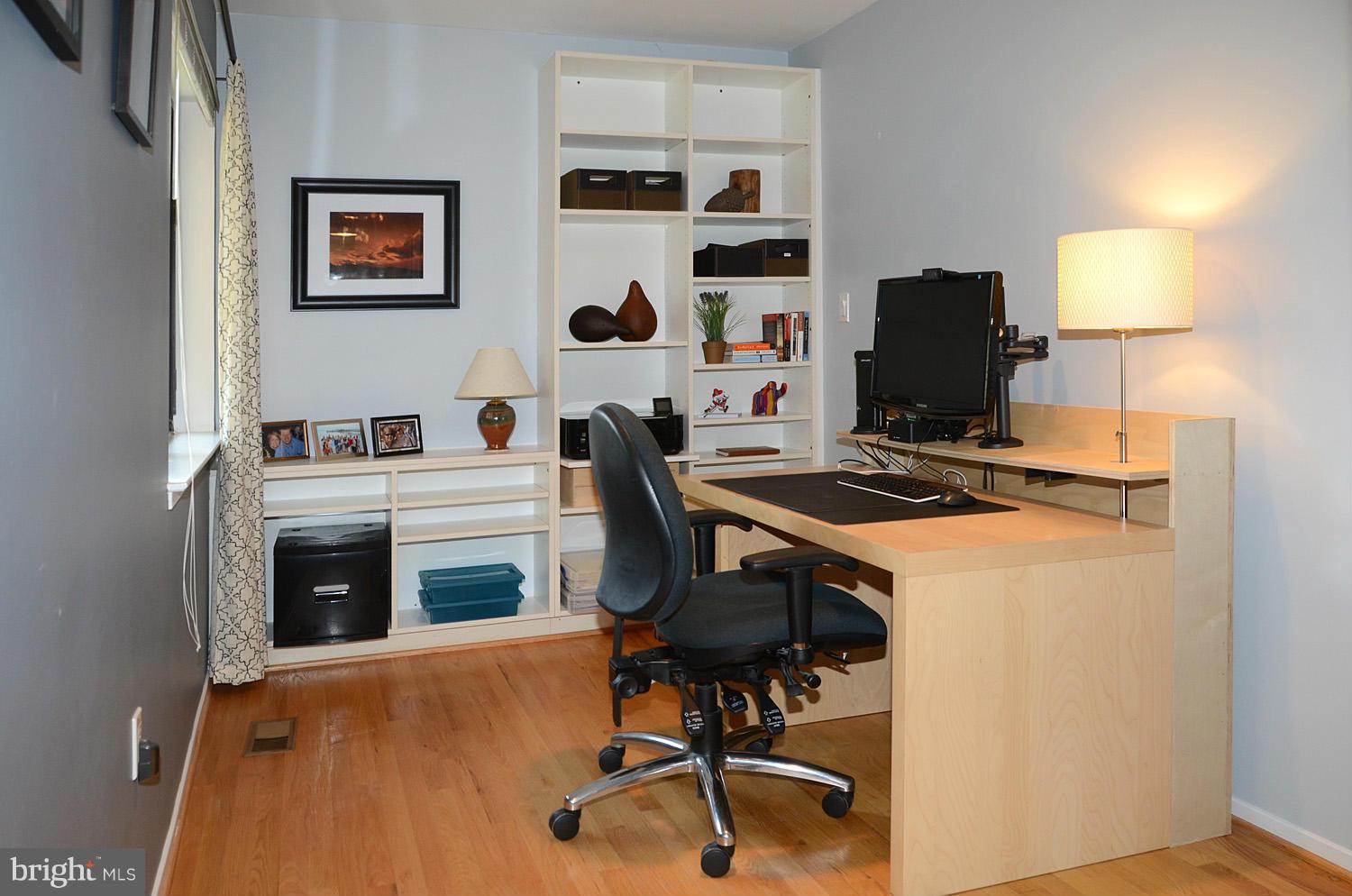 11030 Solaridge Drive Reston, VA 20191 - Photo 27 of 30 a view of a workspace with furniture and a window