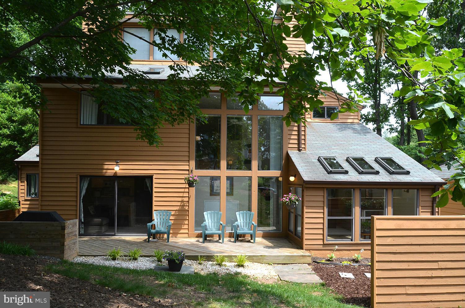 11030 Solaridge Drive Reston, VA 20191 - Photo 28 of 30 a front view of a house with a yard