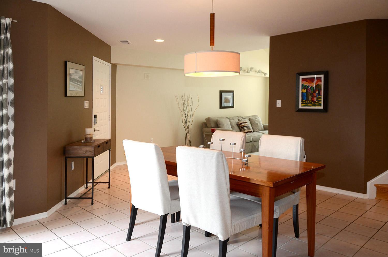 11030 Solaridge Drive Reston, VA 20191 - Photo 8 of 30 a view of a dining room with furniture