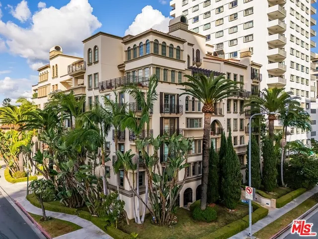 a front view of a multi story residential apartment building