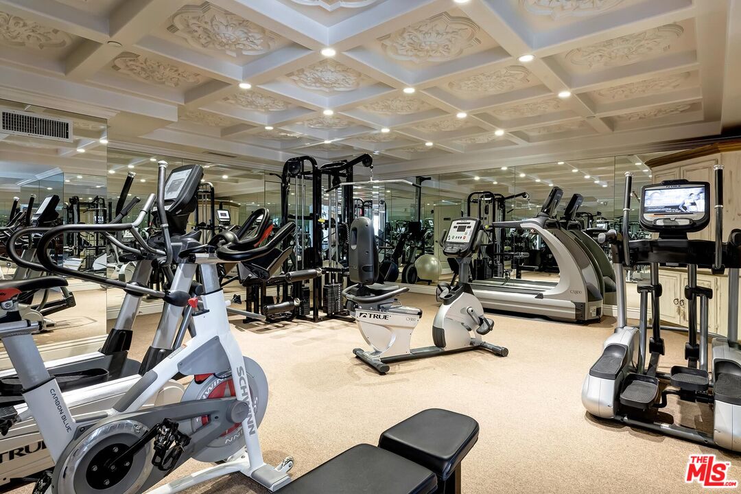 10795 Wilshire Boulevard, Unit 403 Los Angeles, CA 90024 - Photo 19 of 27 a view of a room with gym equipment