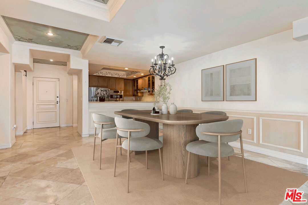 10795 Wilshire Boulevard, Unit 403 Los Angeles, CA 90024 - Photo 3 of 27 a dining room with furniture and window