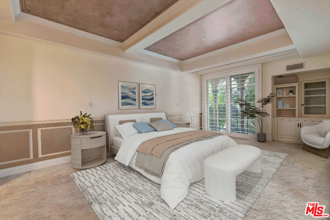 10795 Wilshire Boulevard, Unit 403 Los Angeles, CA 90024 - Photo 7 of 27 a spacious bedroom with a bed and wooden floor