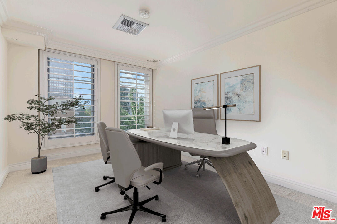 10795 Wilshire Boulevard, Unit 403 Los Angeles, CA 90024 - Photo 10 of 27 a view of a workspace with a table and chair in a room