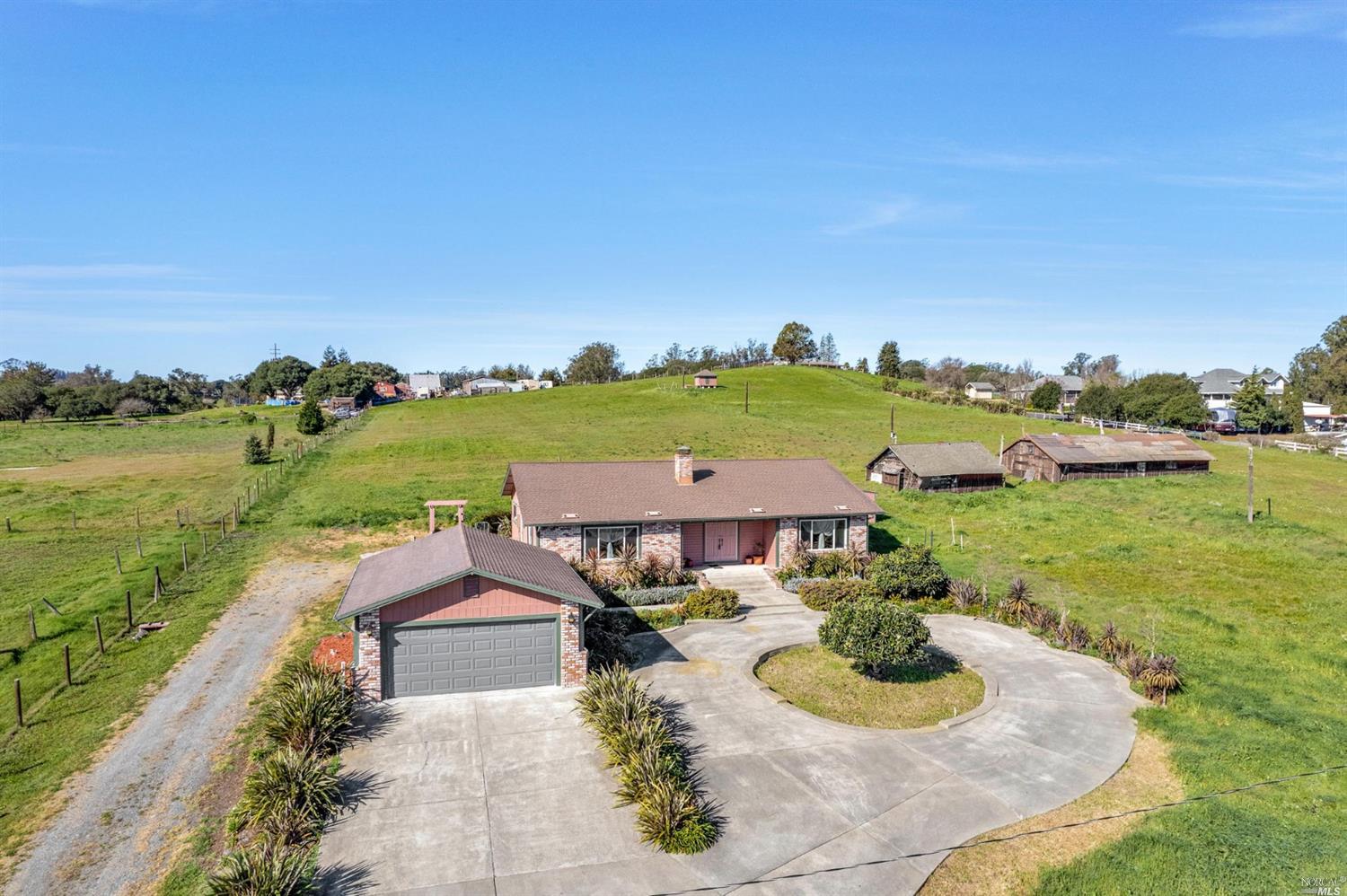 478 Liberty Road Petaluma, CA 94952 - Photo 1 of 1 an aerial view of a house with garden view and lake view