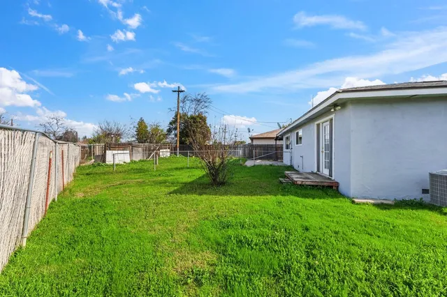 a view of an empty room with storage