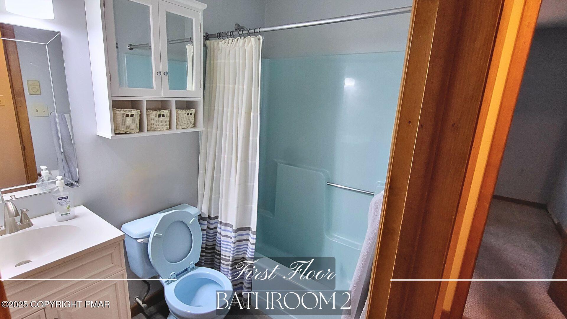 228 Edinburgh Road Bushkill, PA 18324 - Photo 14 of 77 a bathroom with a sink and a mirror