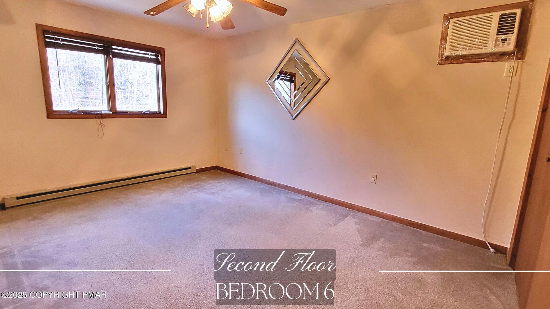 228 Edinburgh Road Bushkill, PA 18324 - Photo 32 of 77 a view of an empty room with a window