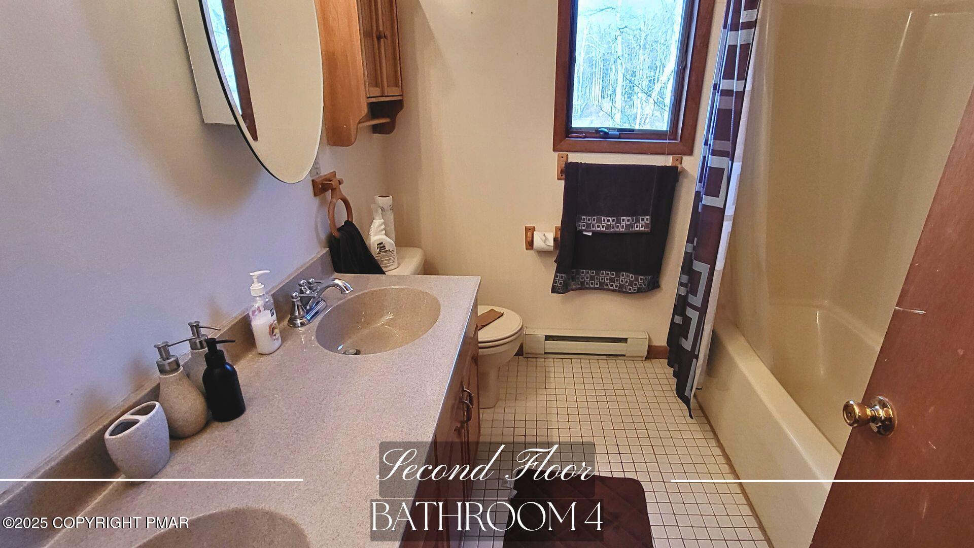 228 Edinburgh Road Bushkill, PA 18324 - Photo 34 of 77 a bathroom with a sink and mirror