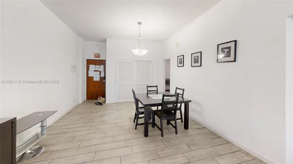 a view of a dining room with furniture