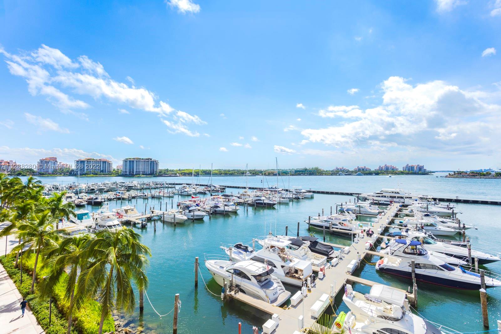 90 Alton Road, Unit 4 Miami Beach, FL 33139 - Photo 9 of 20 a view of a city and lake