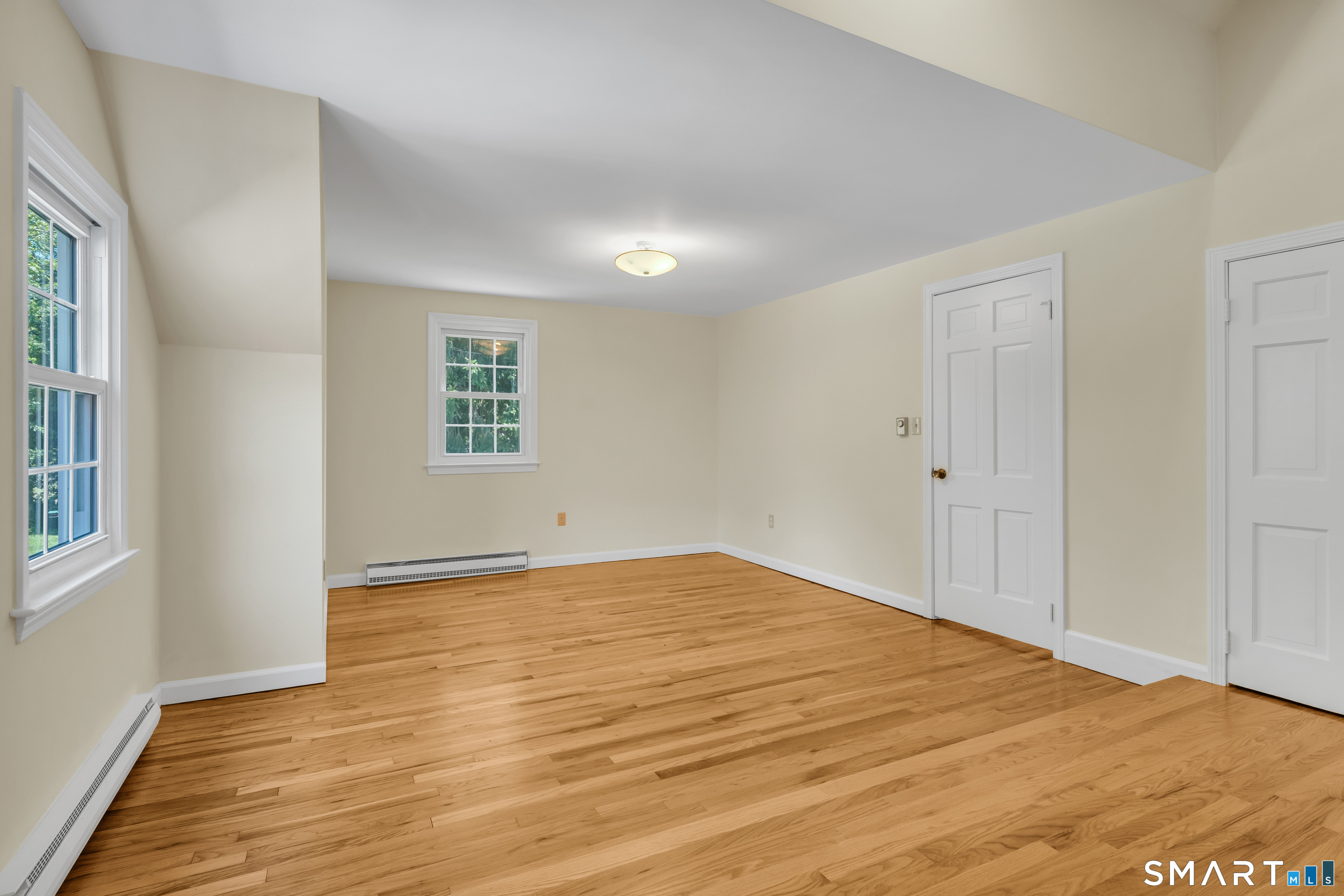 110 Nut Plains Road Guilford, CT 06437 - Photo 31 of 40 This bedroom overlooks the expansive back and side yards.