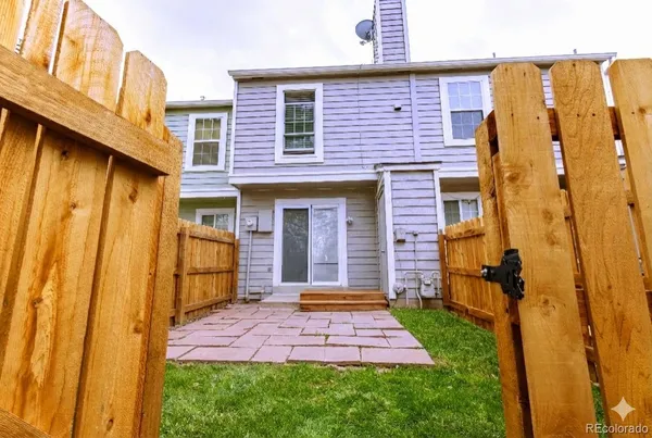 a view of a brick house with front door