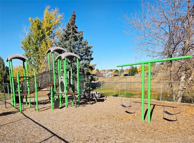 a view of a lake with a palm tree