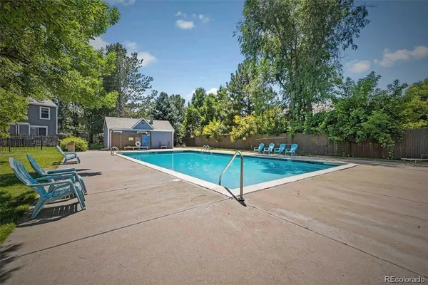 swimming pool with outdoor seating