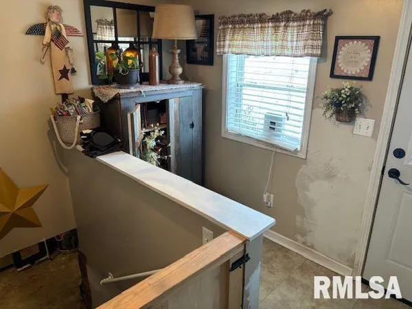 a view of a living room and window