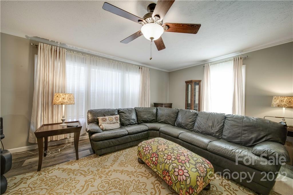 1540 Campbell Road Jefferson, SC 29718 - Photo 14 of 40 a living room with furniture and a window