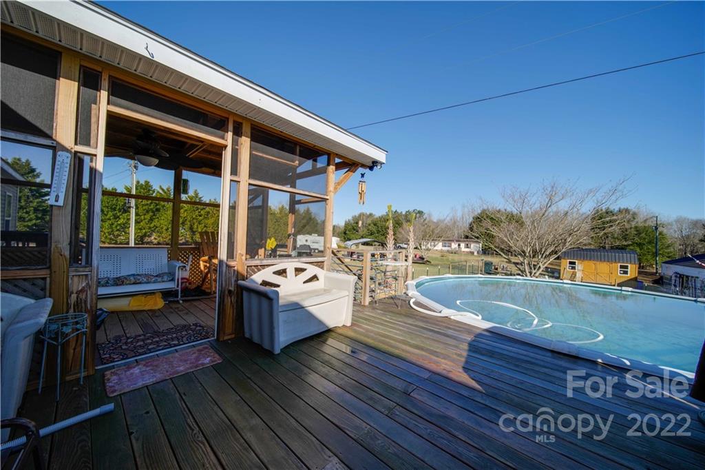 1540 Campbell Road Jefferson, SC 29718 - Photo 28 of 40 a view of roof deck with a barbeque